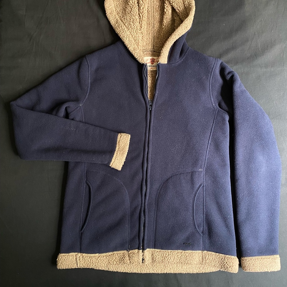 Fluffy zipper jacket with hoodie.